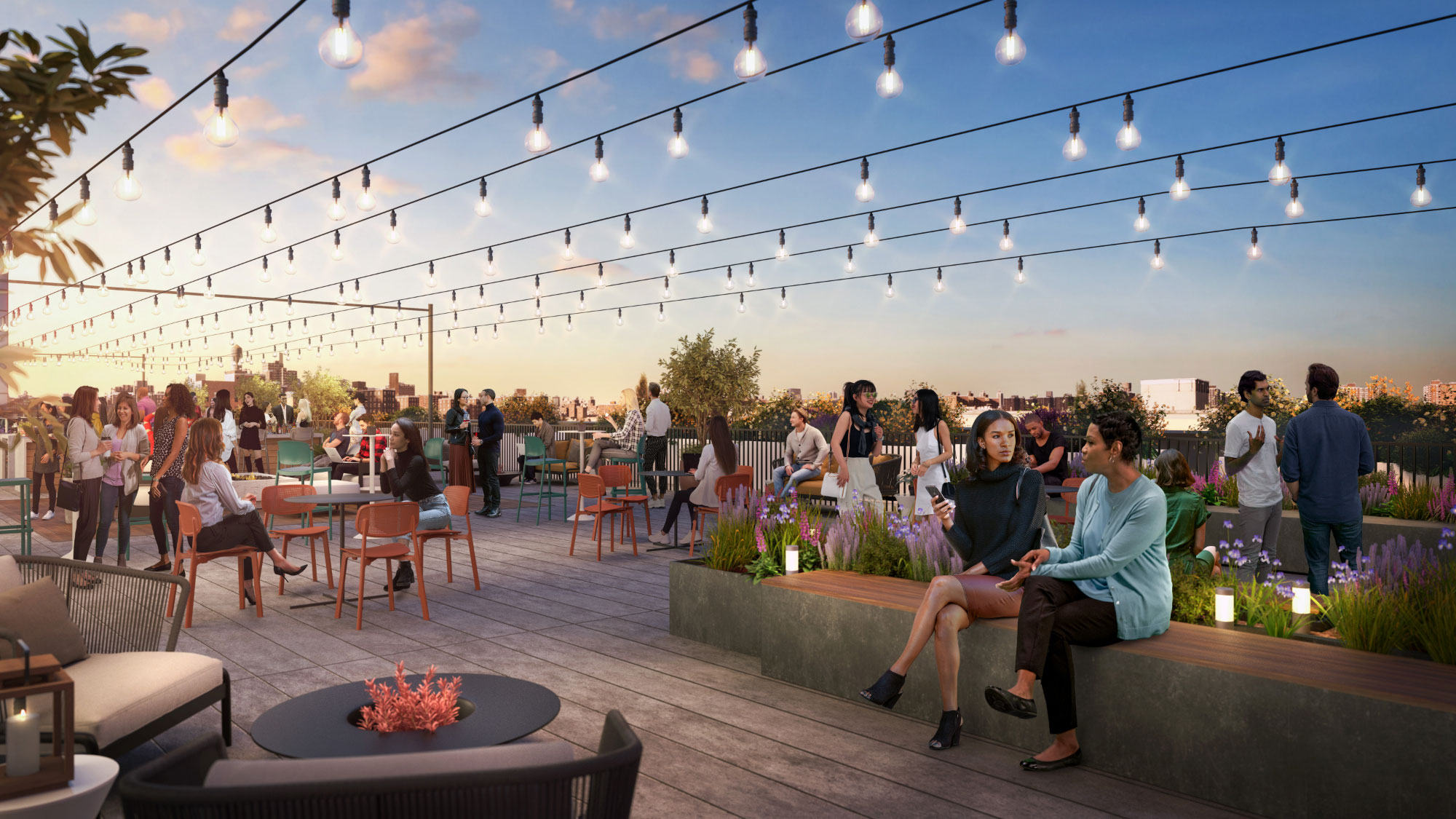A crowd enjoys a rooftop lounge area with string lights